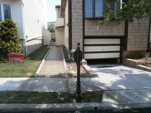 6 - Concrete Driveway / Sidewalk / Brick Paver Walkway (after)